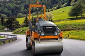 New Tandem Roller driving on Road
